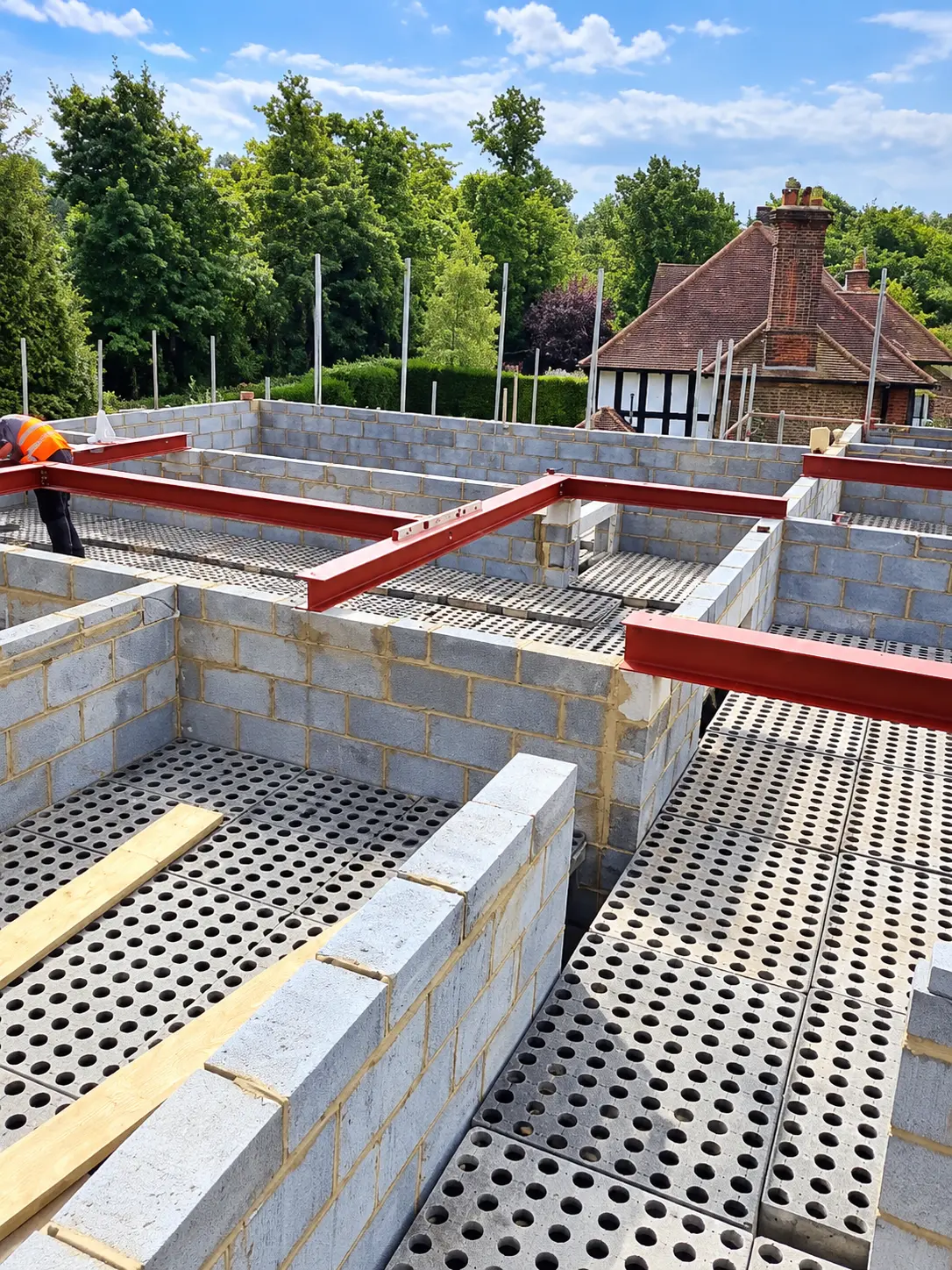Block-and-beam ground floor with steel beams installed on a residential build